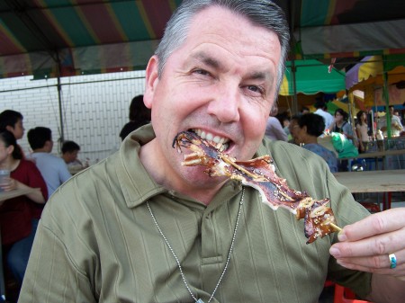 Russ Orvin Eating Squid in Taiwan