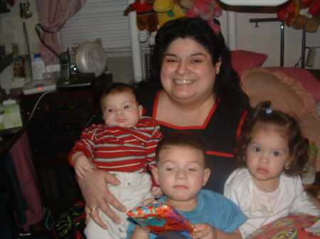 (me) linda, and grandkids: julian, isaiah, serina, (missing john jr.)