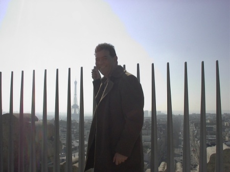 James at "Arc D" Triomphe in Paris.  The Eiffel Tower is in the background.