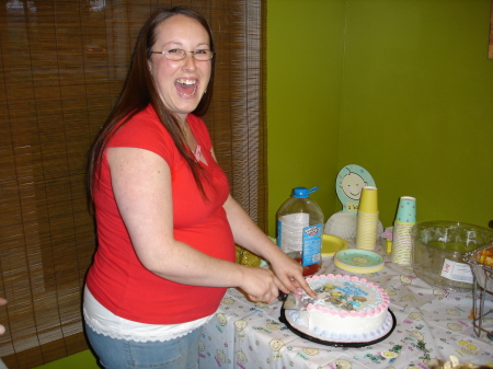 Cutting the cake at my baby shower. May 06