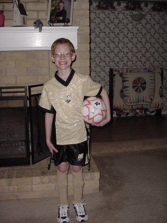 Allen in his upward soccer uniform