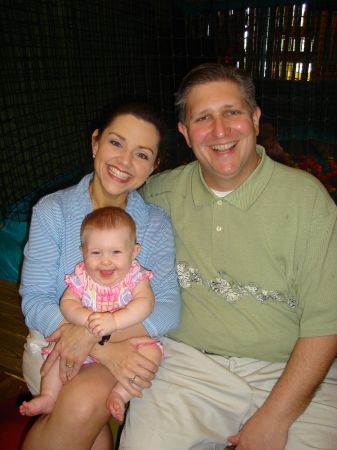 With husband, Jim, and daughter, Ashlyn, in 2006