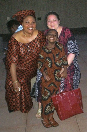 Our friend Lola, Malcolm and me - attending a Nigerian party