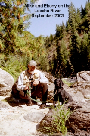 My husband Mike and our dog Ebony on the Lochsa