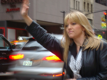 Attempting to hail a cab in NYC