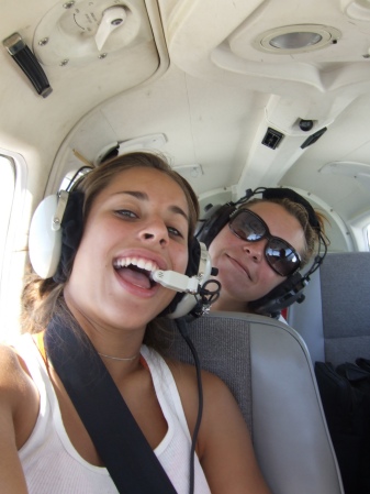 Daughter (Rose) flying right seat and best friend (Erica) in the back