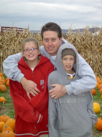 Mam, Kev and Dillon picking pumpkins