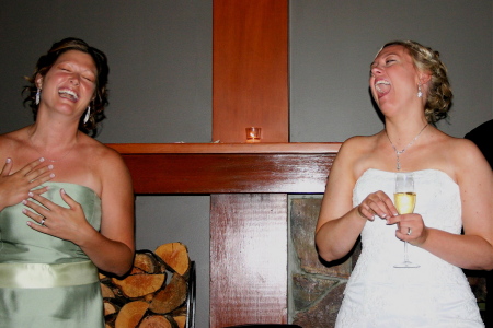 Holly and Chelsea laughing during Maid of Honor Toasting