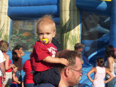My husband and grandson, Carter at 4th of July stuff