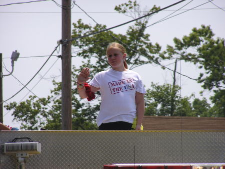 THIS IS KATRINA IN THE 4TH OF JULY PARADE ON TOP OF POP POP'S FIRE TRUCK HE'S THE CHIEF SOOOO  SHE IS THE OLDEST OF GRANDDAUGHTERS AND IS VERY SPOILED BY HER GRANDFATHER