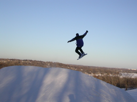 ME Catching Air Snowboarding in Minneapolis