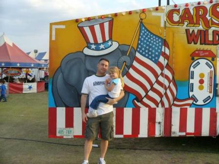 holding my rugrat Ariana at the circus...