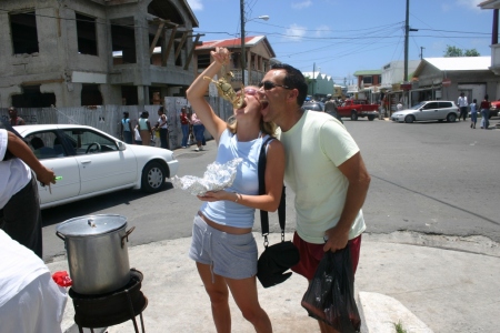 Newlyweds eating Crab in Antigua 04