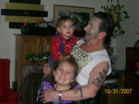 my dad with clarie and zackie