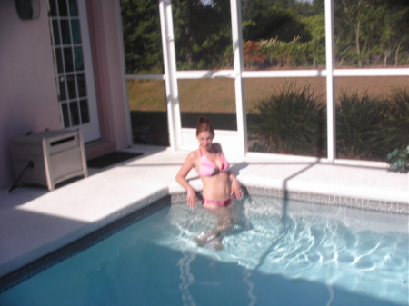 STEPHANIE GETTING SOME SUN IN OUR POOL