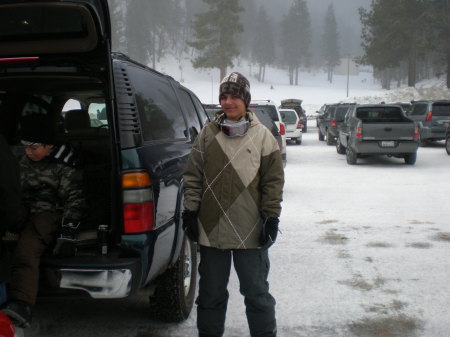 Brandon getting ready to snowboard