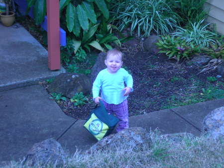 My grand daughter, Alex, in front of my house.