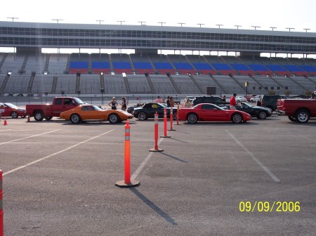 In line to go on the TX Motor Speedway - The Orange 77 and the Red Z06