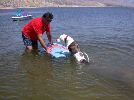 Pete trying to climb on boogie board