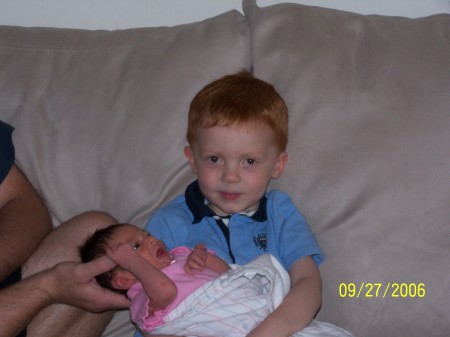 Nathan holding my niece Alyssa