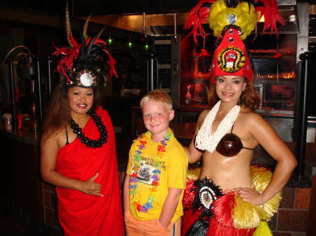 Joseph with the ladies from the luau.