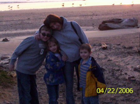 Me and my kids enjoying a sunset on the Oregon Coast!