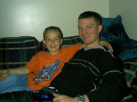 Troy and Kenny in the Rec room playing Video games.