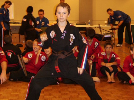 Travis at his red belt exam