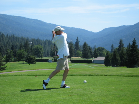 Playing golf in Washington, July 2006