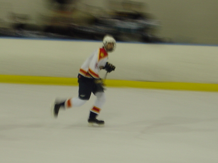 Thad playing hockey.