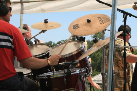 me playing drums at an outdoor service