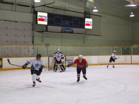 On the Ice ( me on the left  Leafs Jersey)