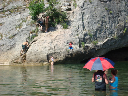 CHAMP JUMPING OFF BLUFF AT LOCAL SWIMMING HOLE