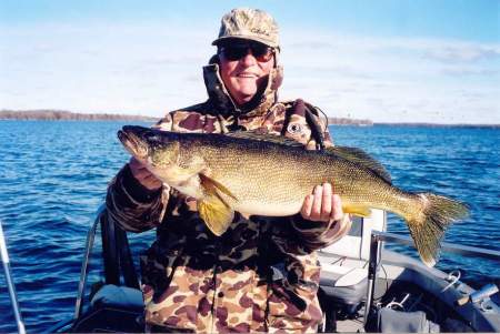 Me with a 31" walleye (pickerel in Manitoba)