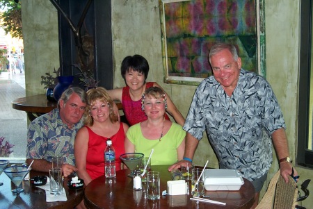 Coach Davis and wives at Cabos
