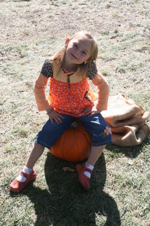 Rachel on a pumpkin - October festivities