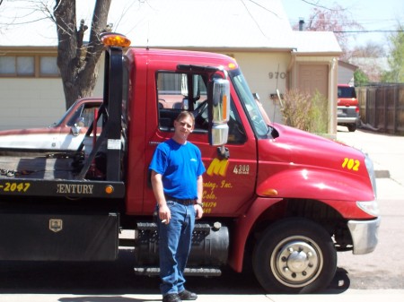 Husband & his tow truck