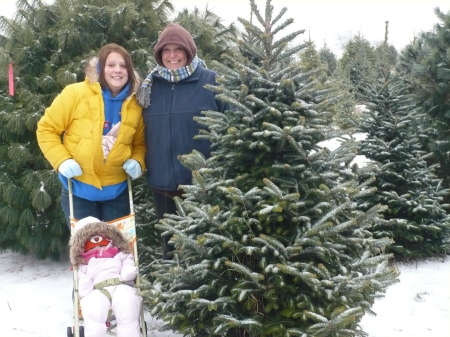 Cutting down her first tree!