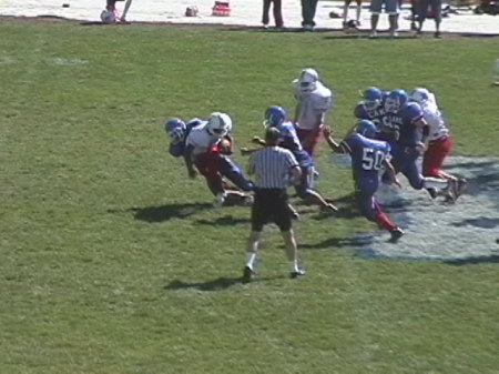 Rob busting thru the line for a tackle.
