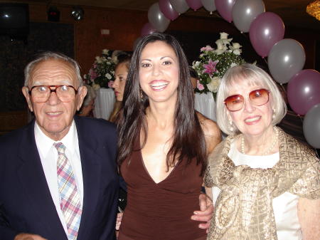 Uncle Eddie, Aunt Joanie and I at their nephews wedding