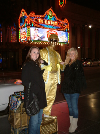 Miranda and Cassie with a street performer
