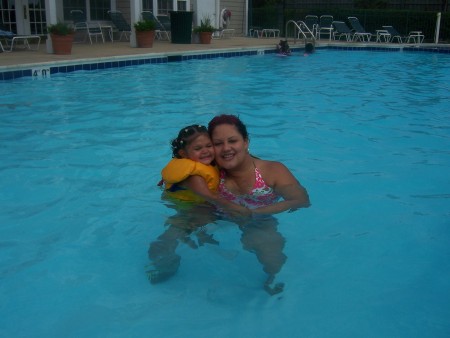 madee and her daughter kailani at her pool