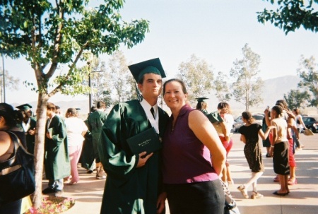 Our oldest boy Tommy with his Aunt at his graduation
