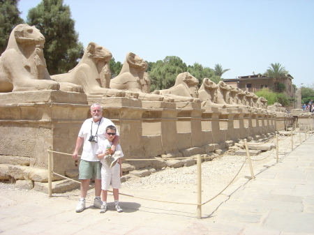 On the Avenue of The Sphinxes at Luxor Temple, Egypt with son Michael.