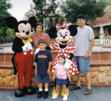 My son, Dallas. My daughter-in-law, Angie. My grandchildren, Brett and Devynn at Disneyland