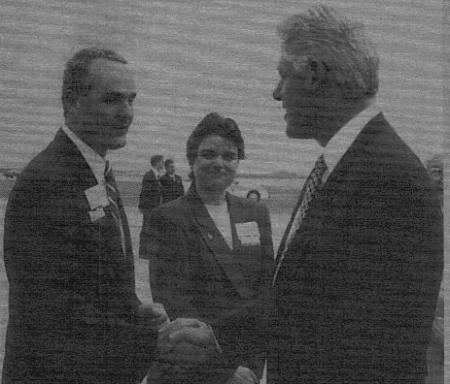 Gerry Nolan greeting Bill Clinton at Orlando International Airport