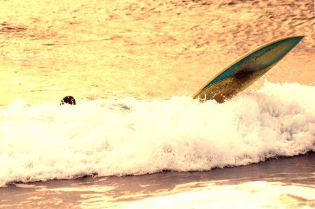 The worst day surfing beats the best day__________.