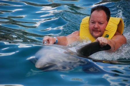 Me swimming with a dolphin in Cozumel, Mexico