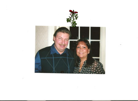 MY HUSBAND AND I AT HIS COMPANY CHRISTMAS PARTY 2007