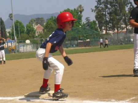 Anthony playing baseball